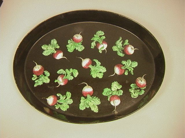 Piero Fornasetti Oval Metal Tray With wide raised: Piero Fornasetti Oval Metal Tray With wide raised rim. Decorated with colorful radishes on black background.-- Dimensions: H: 20 inches: W: 15.5 inches: D: 1.75 inches ---