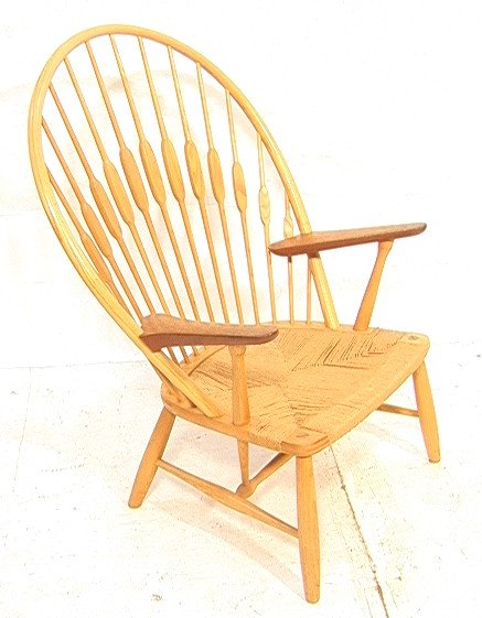 HANS WEGNER Peacock Chair for JOHANNES HANSEN. T: HANS WEGNER Peacock Chair for JOHANNES HANSEN. Teak & birch frame. Branded mark. -- Dimensions: H: 41.5 inches: W: 32 inches: D: 28 inches ---