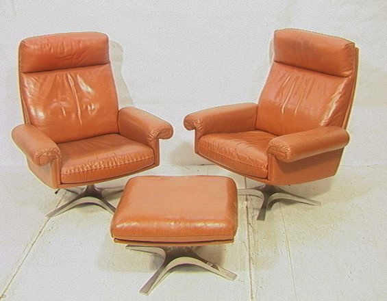 3 PCS Leather Seating. DE SEDE. Two Leather Loung: 3 PCS Leather Seating. DE SEDE. Two Leather Lounge Chairs and one matching ottoman. Nice stitching detail to cushions. Aluminum four foot base.-- Dimensions: H: 40 inches: W: 35.5 inches: D: 30 inches