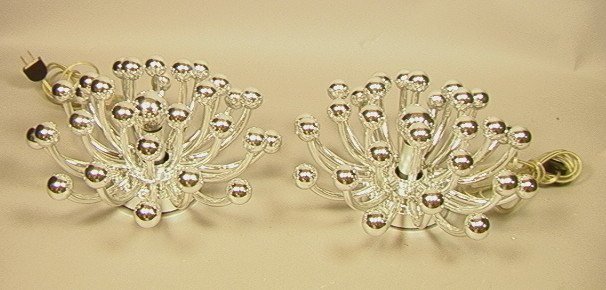 Pr VALENTI Italy Sprocket Wall Sconces. Silver Me: Pr VALENTI Italy Sprocket Wall Sconces. Silver Metallic Plastic 'Splash" Lights. Pistilino Model. Tetrarsh, designer. Marked-- Dimensions: H: 12 inches: W: 6 inches ---