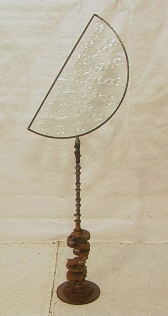 FELICIANO BEJAR Industrial Sculpture Magiscope. T: FELICIANO BEJAR Industrial Sculpture Magiscope. Tall floor model with large semi circle Magiscope. Crank shaft steel base. Signed & dated 89. -- Dimensions: H: 74 inches: W: 24 inches: D: 12 inches --