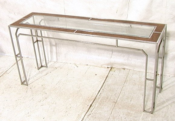 MILO BAUGHMAN Burl Wood Chrome Console Table. Chr: MILO BAUGHMAN Burl Wood Chrome Console Table. Chrome Thin Rod Frame. Faux Burl Wood Panels in top. Inset Glass. Hall table. Unmarked. -- Dimensions: H: 27 inches: D: 16.5 inches: L: 58 inches ---