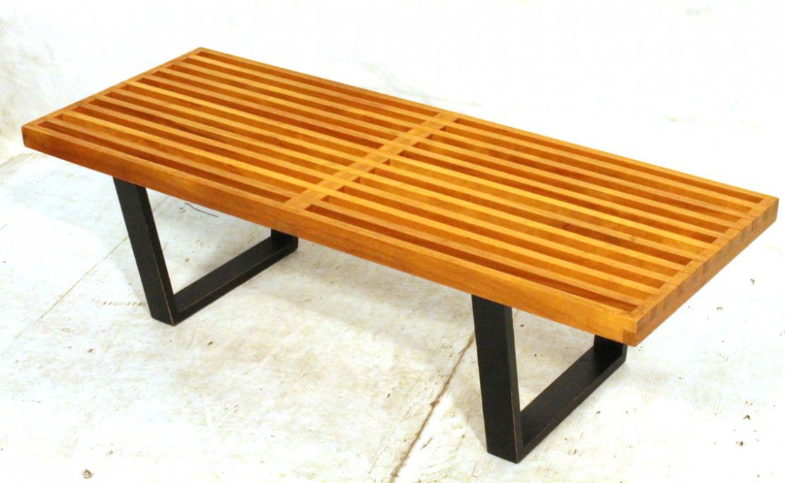 GEORGE NELSON Herman Miller Slat Bench. Light Woo: GEORGE NELSON Herman Miller Slat Bench. Light Wood with black ebonized legs. Unmarked.-- Dimensions: H: 14 inches: W: 48 inches: D: 18.5 inches ---