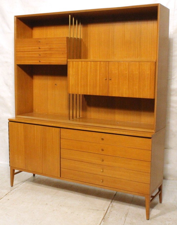PAUL McCOBB Irwin Collection. 2 Piece Cabinet. To: PAUL McCOBB Irwin Collection. 2 Piece Cabinet. Top has 4 drawers, (not attached) and 2 doors. Base has 5 drawers with one door. Metal tag. -- Dimensions: H: 84 inches: D: 19.25 inches: L: 72 inches --