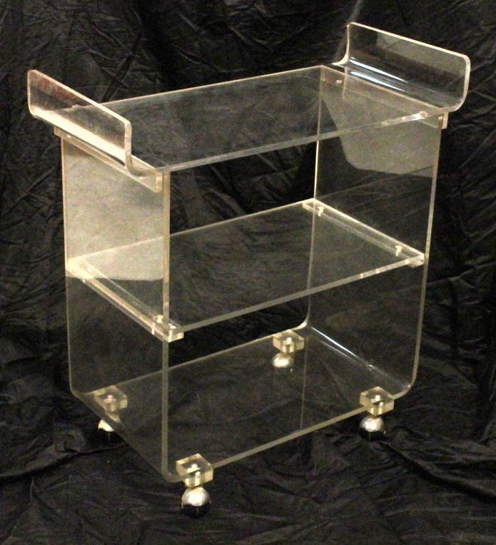Lucite 3 tier Tea Bar Cart on Chrome Casters.: Lucite 3 tier Tea Bar Cart on Chrome Casters. -- Dimensions: H: 31.5 inches: W: 30 inches: D: 16 inches ---