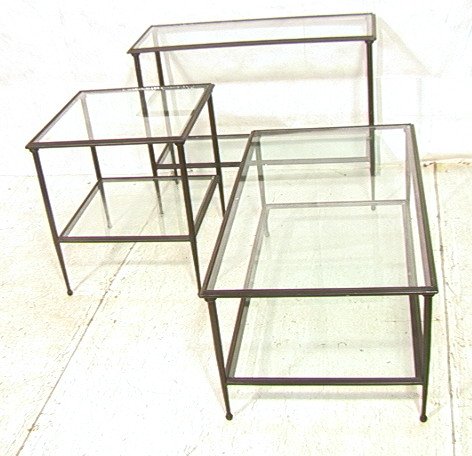 Set 3 Brown Metal Frame Glass Top Tables. All hav: Set 3 Brown Metal Frame Glass Top Tables. All have lower inset glass shelf. Tapered metal drumstick legs. Heavy construction. 3 PCS-- Dimensions: H: 29 inches: W: 38 inches: D: 14 inches ---