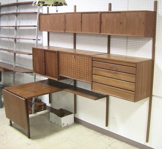 Danish Teak POUL CADOVIUS Shelf Cabinet Wall Unit: Danish Teak POUL CADOVIUS Shelf Cabinet Wall Unit Desk. Drop side desk. Six cabinets; one with drop front desk. Unmarked. -- Dimensions: ---