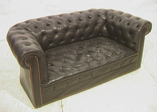 Black Tufted Leather Chesterfield Sofa Couch. Bra: Black Tufted Leather Chesterfield Sofa Couch. Brass stud trim.-- Dimensions: H: 28.5 inches: D: 33 inches: L: 66.5 inches ---