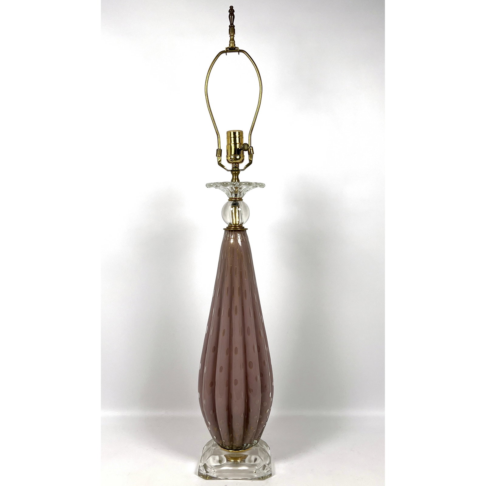 Mauve Italian Murano Art Glass Lamp. Fluted Teardrop Form has gilt rimmed Polka dot details. Clear G: Mauve Italian Murano Art Glass Lamp. Fluted Teardrop Form has gilt rimmed Polka dot details. Clear Glass Trim elements. Dimensions: Height: 34.25 inches, Width: 5.75 inches, Depth: 5.75 inches. --- US