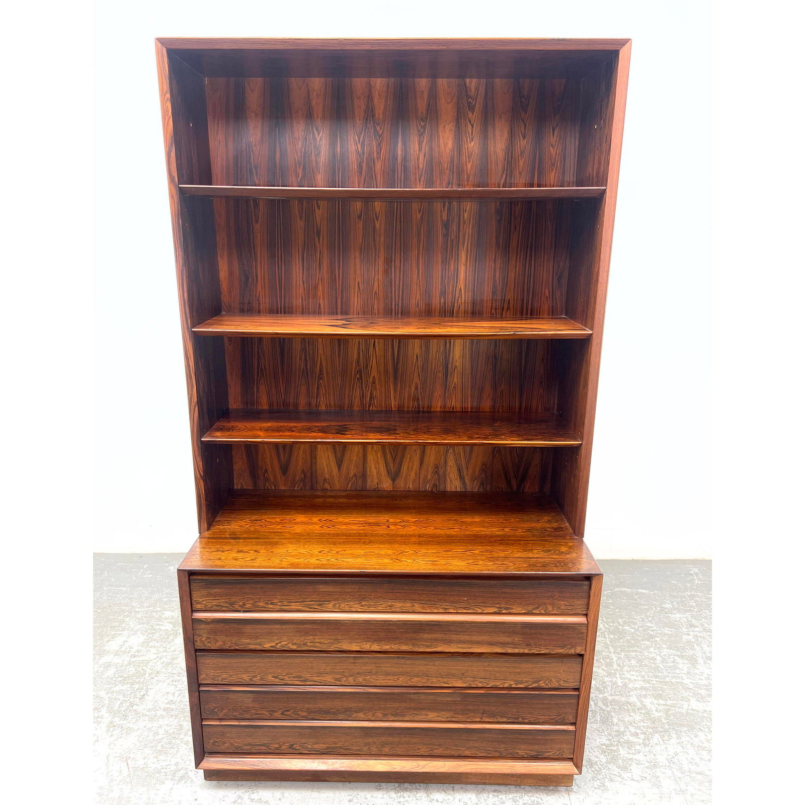 Danish Modern Rosewood Bookcase Dresser. 5 drawer low dresser with Unattached Bookcase top. Has beve: Danish Modern Rosewood Bookcase Dresser. 5 drawer low dresser with Unattached Bookcase top. Has beveled edge. Dimensions: Height: 72.5 inches, Width: 39.5 inches, Depth: 18.5 inches. --- - We offer cu