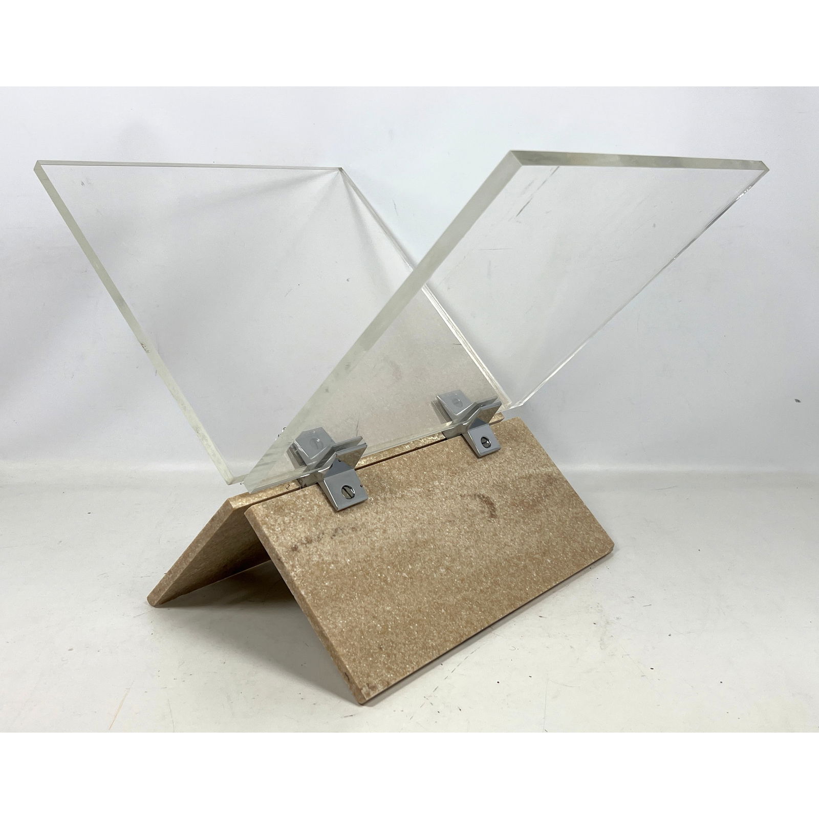 Mid Century Modern Lucite and Faux Travertine Magazine Rack . Base probably Corian.: Mid Century Modern Lucite and Faux Travertine Magazine Rack . Base probably Corian. Dimensions: Height: 16 inches, Width: 21 inches, Depth: 16 inches. --- - We offer curbside delivery for most items t