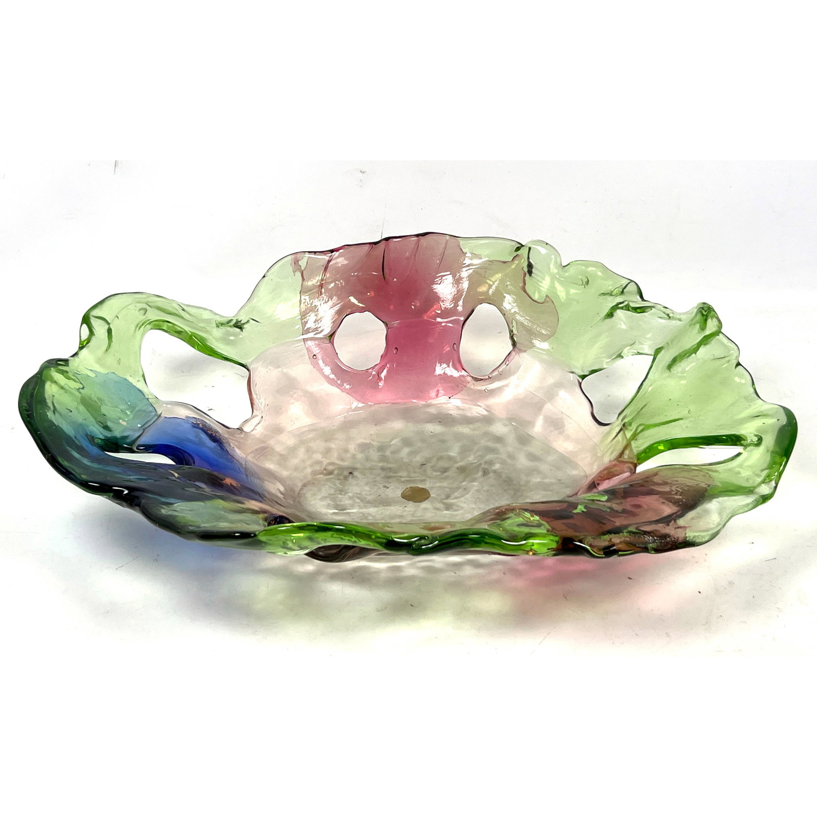 Salviati Murano art glass bowl, crafted in a free-form biomorphic style. This shallow dish features: Salviati Murano art glass bowl, crafted in a free-form biomorphic style. This shallow dish features an undulating, ruffled rim and irregular cutouts/perforations around its sides. Dimensions: Height: 