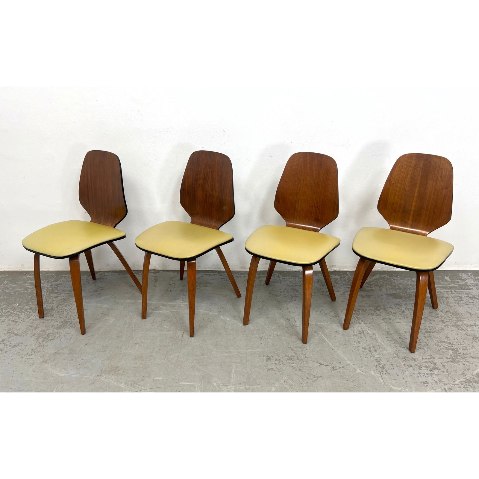 Set 4 GEORGE MULHAUSER for PLYCRAFT Dining Chairs. Laminated Plywood Side Chairs with Vinyl Seats. E: Set 4 GEORGE MULHAUSER for PLYCRAFT Dining Chairs. Laminated Plywood Side Chairs with Vinyl Seats. Elegant form. Dimensions: Height: 33 inches, Width: 18 inches, Depth: 18 inches. - Seat Height: 18 in