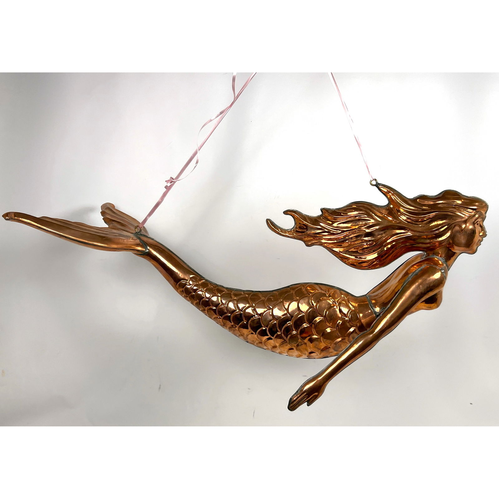 Copper Mermaid Hanging Figural Sculpture. Long flowing hair.: Copper Mermaid Hanging Figural Sculpture. Long flowing hair. Dimensions: Height: 16 inches, Width: 12 inches, Depth: 28 inches. --- US Packing and Shipping charge: In house shipping available. Will be