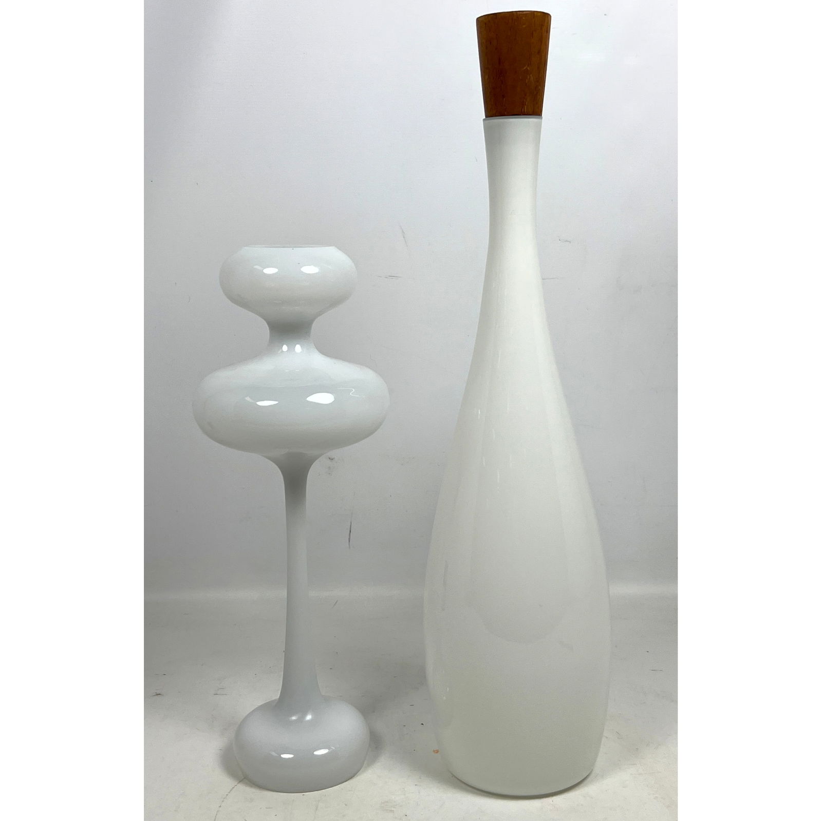 2pcs Danish Modern Denmark Holmegaard Glass Teak Stoppered Bottle and Candlestick Illums Boligus: 2pcs Danish Modern Denmark Holmegaard Glass Teak Stoppered Bottle and Candlestick Illums Boligus Dimensions: Height: 19.5 inches, Width: 5 inches, Depth: 5 inches. --- US Packing and Shipping charge: