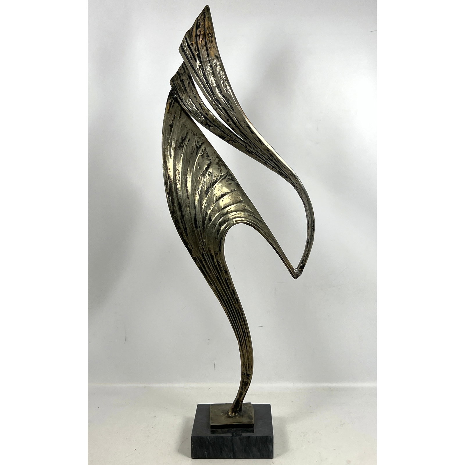 Aluminum 1997 CASCO Modernist Abstract Sculpture. Pleated style form on Marble Base. Signed and Date: Aluminum 1997 CASCO Modernist Abstract Sculpture. Pleated style form on Marble Base. Signed and Dated. Dimensions: Height: 38.5 inches, Width: 12.5 inches, Depth: 7 inches. --- - We offer curbside del