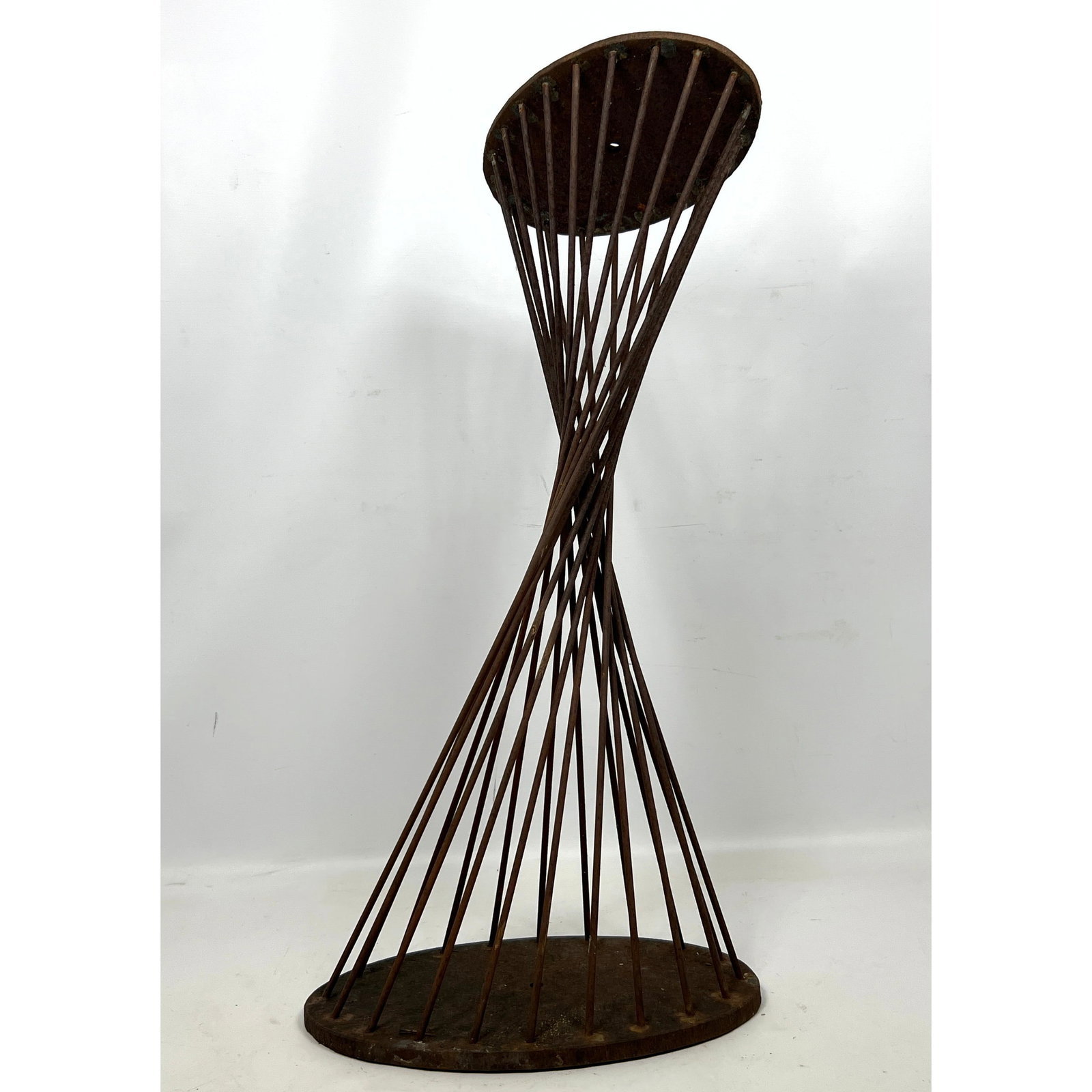 Modernist Iron Sculpture. Hourglass rod form.: Modernist Iron Sculpture. Hourglass rod form. Dimensions: Height: 25.5 inches, Width: 12 inches, Depth: 8 inches. --- US Packing and Shipping charge: In house shipping available. Will be calculated on