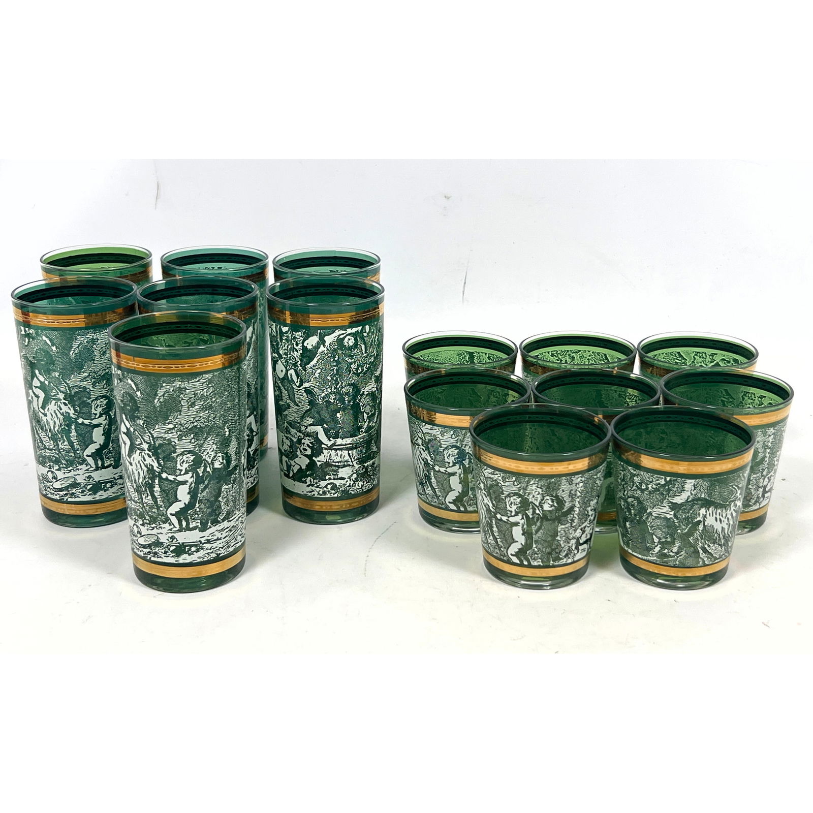 Set 15 drinking glasses, in the style of Piero Fornasetti. Green glass forms with white enameled des (1 of 11)