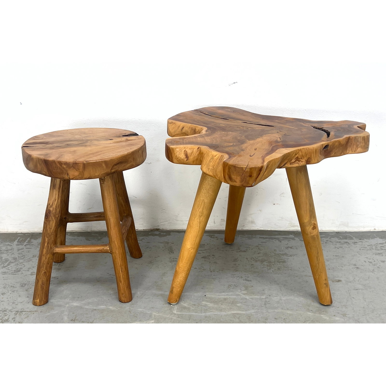 2pc Heavy tree slice stools. One round, one freeform.: 2pc Heavy tree slice stools. One round, one freeform. Dimensions: Height: 17 inches, Width: 22 inches, Depth: 22.5 inches. - Additional Dimensions: Smaller H: 16 inches, W: 12 inches, D: 12 inches ---
