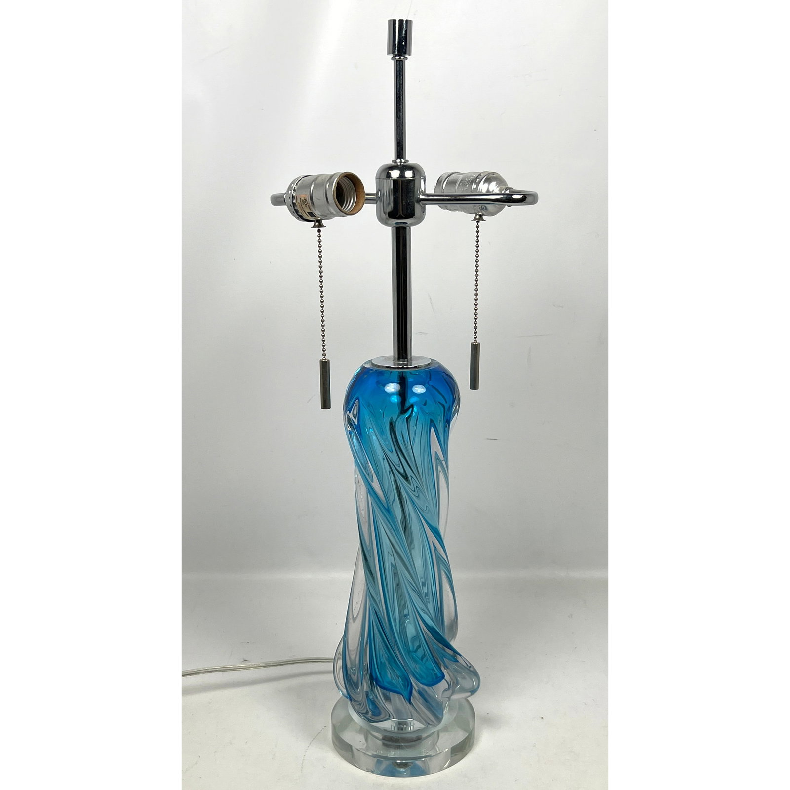 Italian Murano Glass Table Lamp. Twisted design.: Italian Murano Glass Table Lamp. Twisted design. Dimensions: Height: 24.5 inches, Width: 6 inches, Depth: 6 inches. --- US Packing and Shipping charge: In house shipping available. Will be calculated 