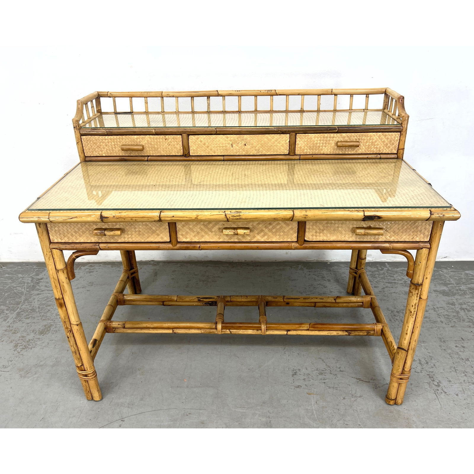 Bamboo and Rattan Low Writing Desk Vanity.: Bamboo and Rattan Low Writing Desk Vanity. Dimensions: Height: 39 inches, Width: 47.5 inches, Depth: 28.5 inches. --- - We offer curbside delivery for most items to NYC, Manhattan, Close Brooklyn, Hob
