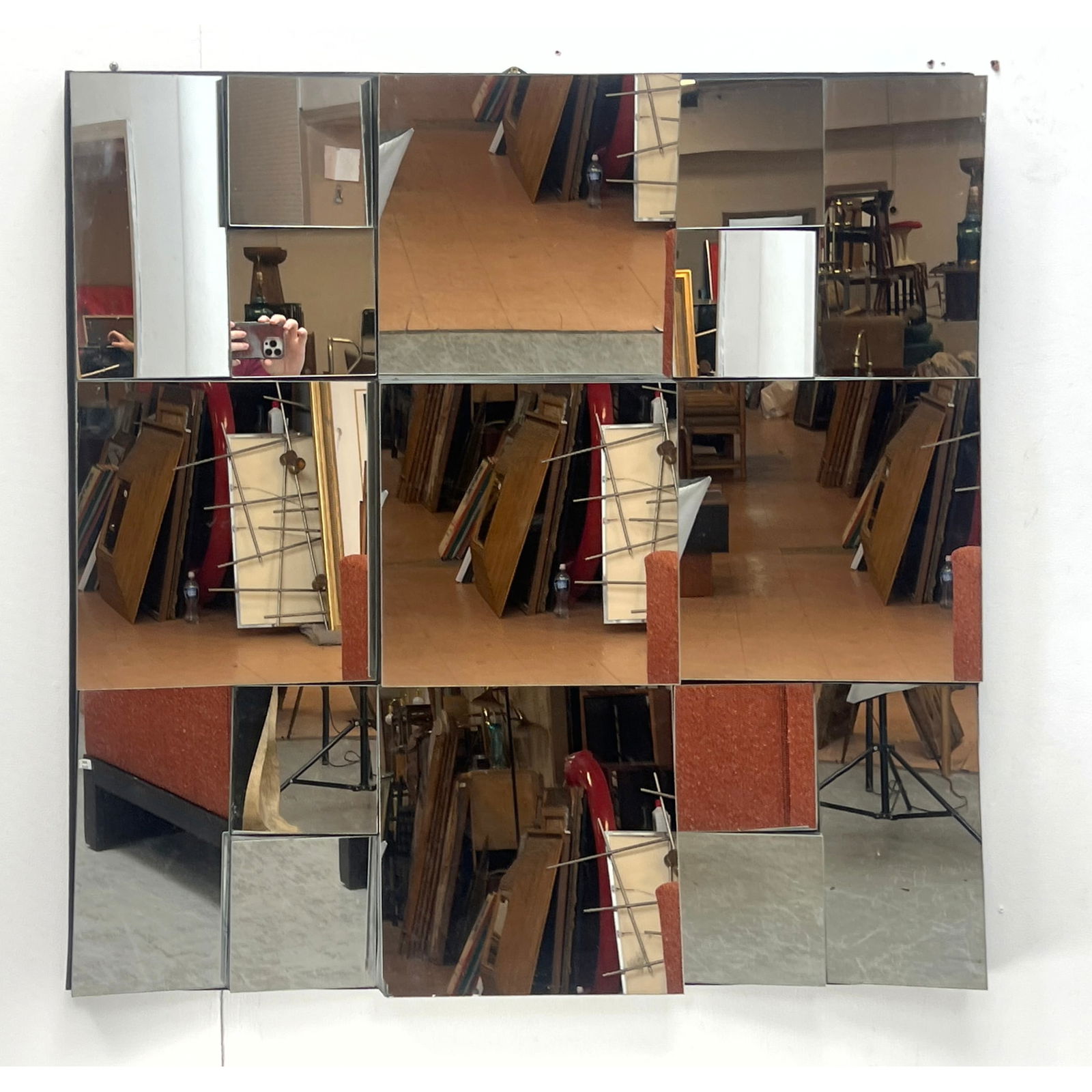 Neal Small Style Faceted angled Wall Mirror. Unmarked.: Neal Small Style Faceted angled Wall Mirror. Unmarked. Dimensions: Height: 36 inches, Width: 36 inches, Depth: 3 inches. --- - We offer curbside delivery for most items to NYC, Manhattan, Close Brookl