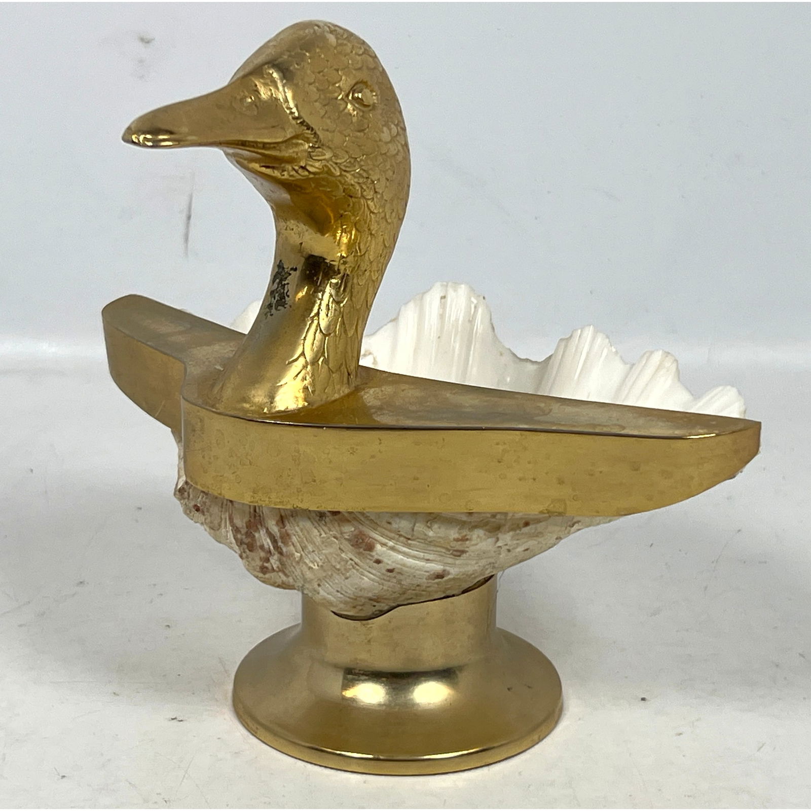 Decorative Brass and Real Shell Bob Bon Dish.: Decorative Brass and Real Shell Bob Bon Dish. Dimensions: Height: 8 inches, Width: 8 inches, Depth: 8 inches. --- US Packing and Shipping charge: In house shipping available. Will be calculated once d