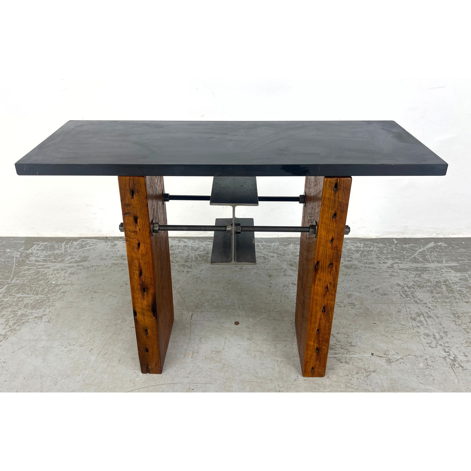 Artisan Studio Woodworker Industrial I Beam Console Table. Thick Wood Plank Legs with heavy steel an: Artisan Studio Woodworker Industrial I Beam Console Table. Thick Wood Plank Legs with heavy steel and I Beam Stretchers. Natural Slate Top Hall Sofa Table. Unmarked. Dimensions: Height: 32 inches, Wid