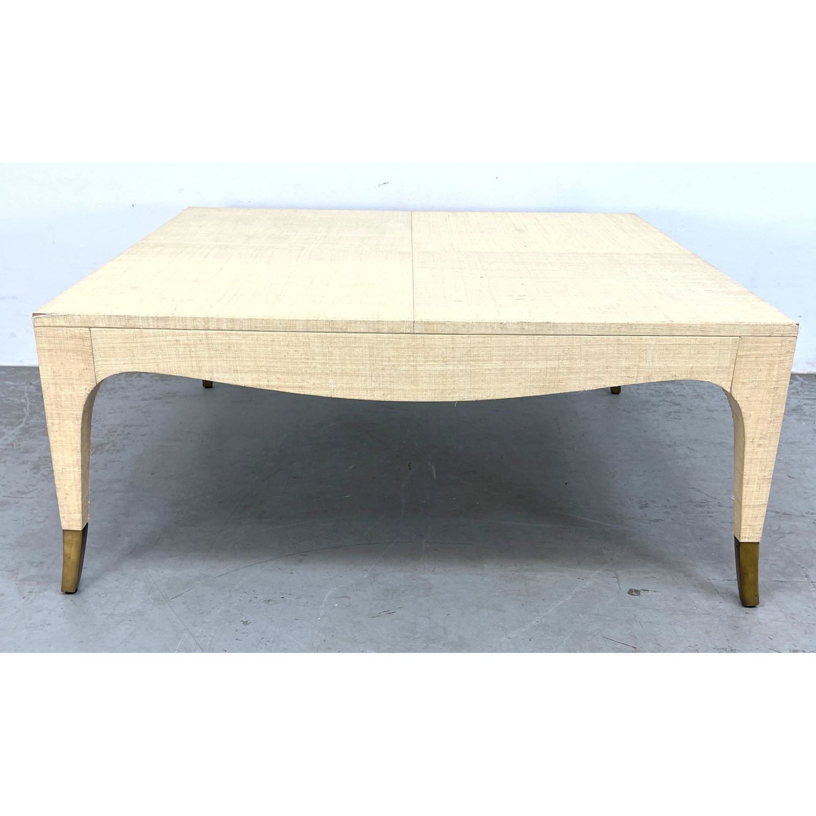 Hollywood Regency aesthetic grass cloth covered coffee table brass capped legs. (1 of 10)