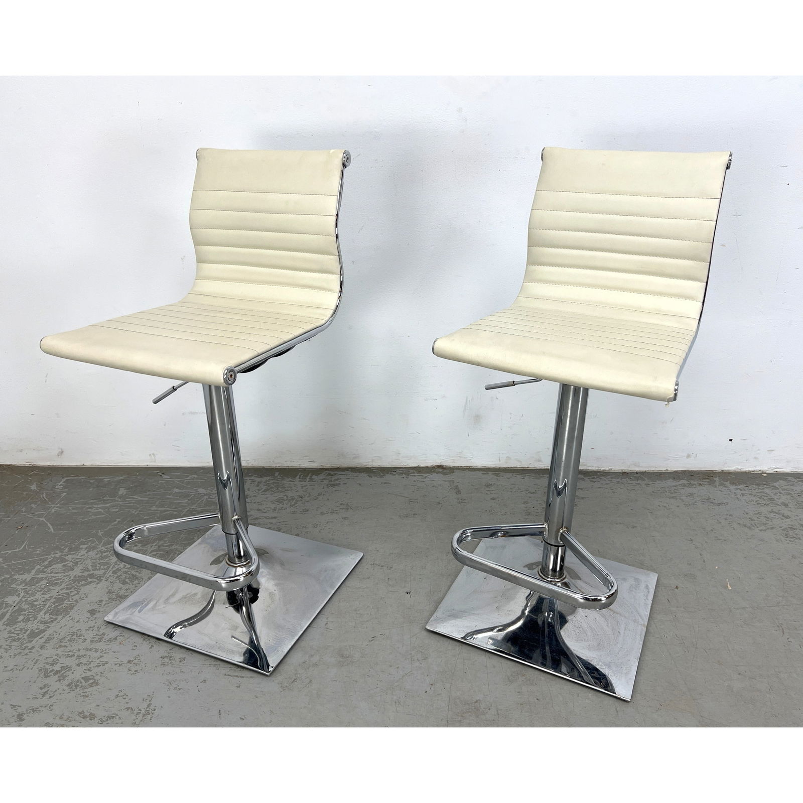Pair of modern adjustable bar stools by Lumi Source, Inc. (1 of 14)