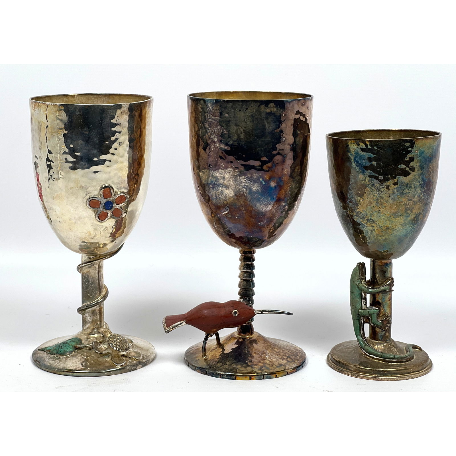 3pc EMILIA CASTILLO Silver Plate Goblets. Wine, Water Stemware. Figural Stone Mosaic Lizard or Hum: 3pc EMILIA CASTILLO Silver Plate Goblets. Wine, Water Stemware. Figural Stone Mosaic Lizard or Hummingbird. Inlaid Floral and Leaf Motif. Mexico. All have Emilia Castillo Hallmarks. Dimensions: Height