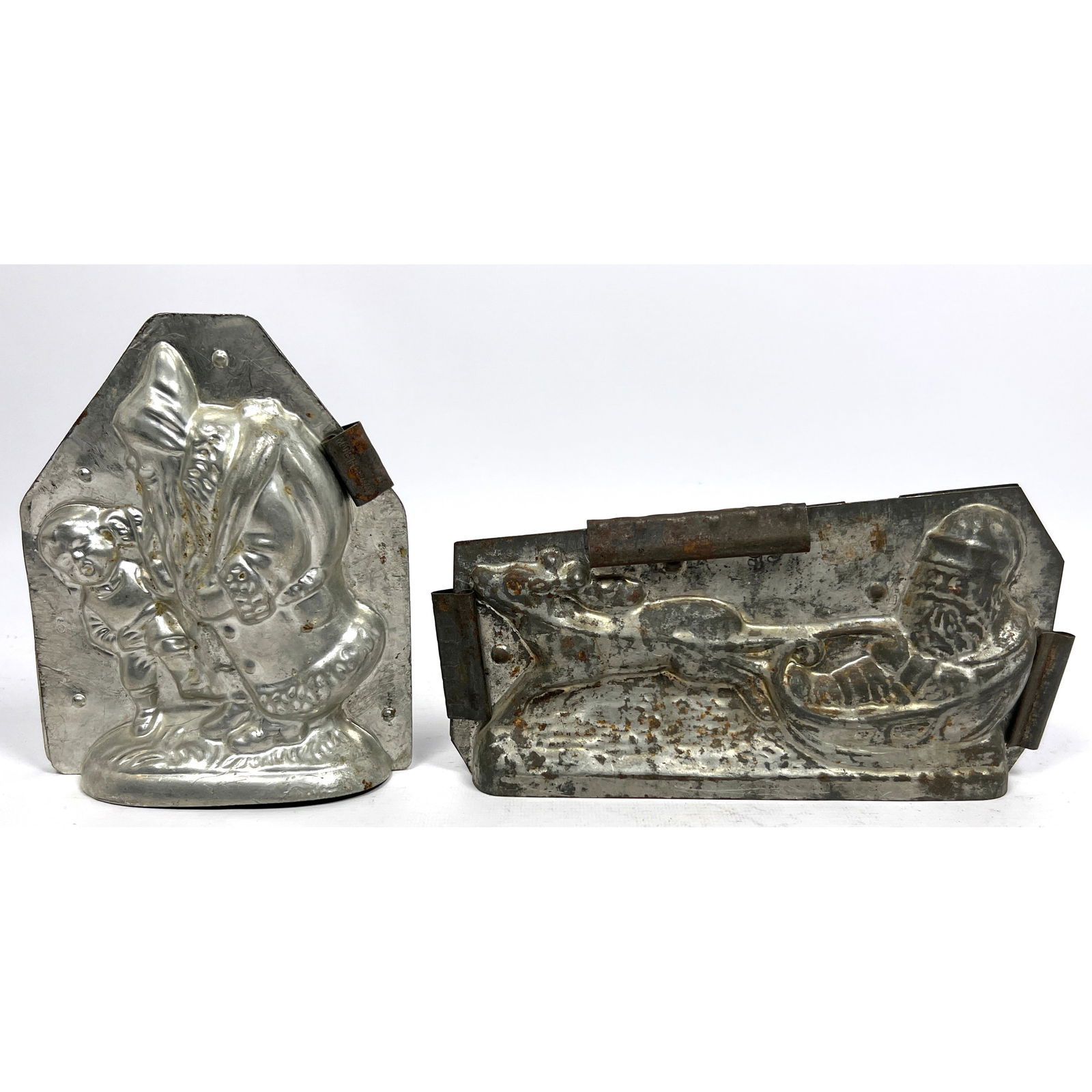 2pc Vintage Santa Claus Chocolate Confectionary Molds. 1) St Nick holding child. Marked 6.  2) Santa (1 of 12)