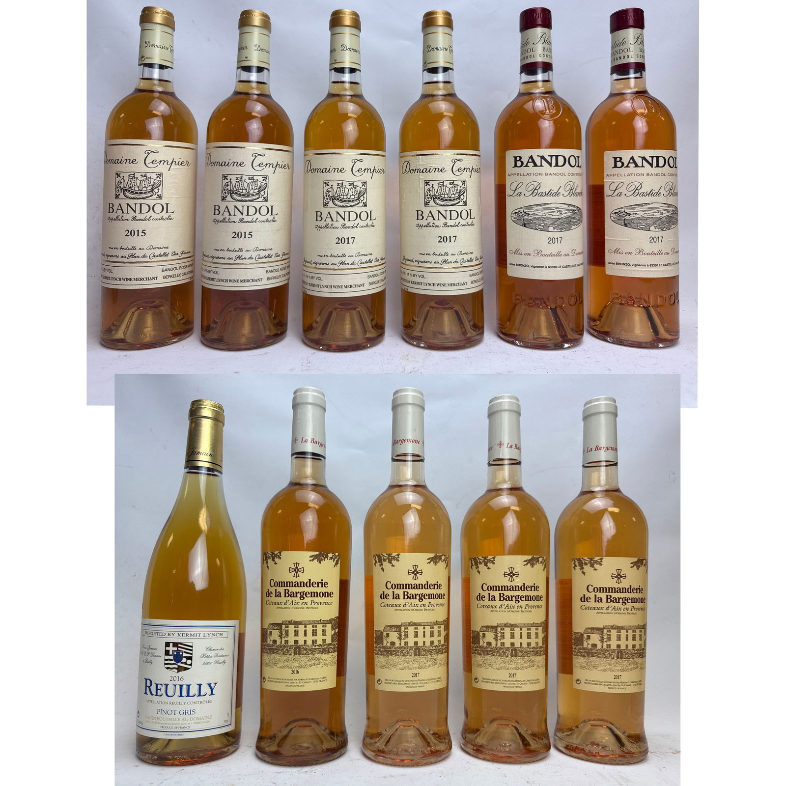 11pc French wine bottles, predominantly rose, with one white wine. The assortment features four bott: 11pc French wine bottles, predominantly rose, with one white wine. The assortment features four bottles of Domaine Tempier Bandol Rose (two 2015, two 2017), each sealed with a gold foil capsule featur