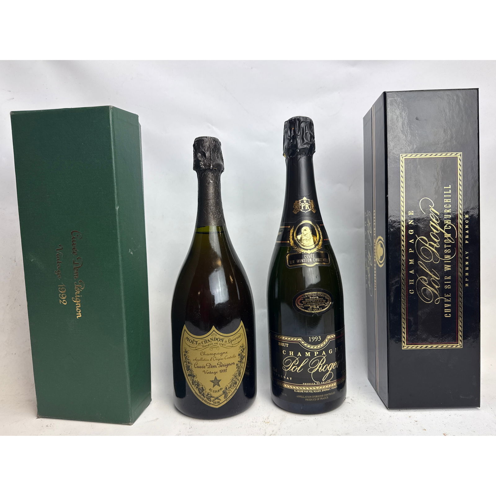 2pcs bottles of vintage French champagne, each presented in its original retail packaging.  1992 Moe (1 of 12)