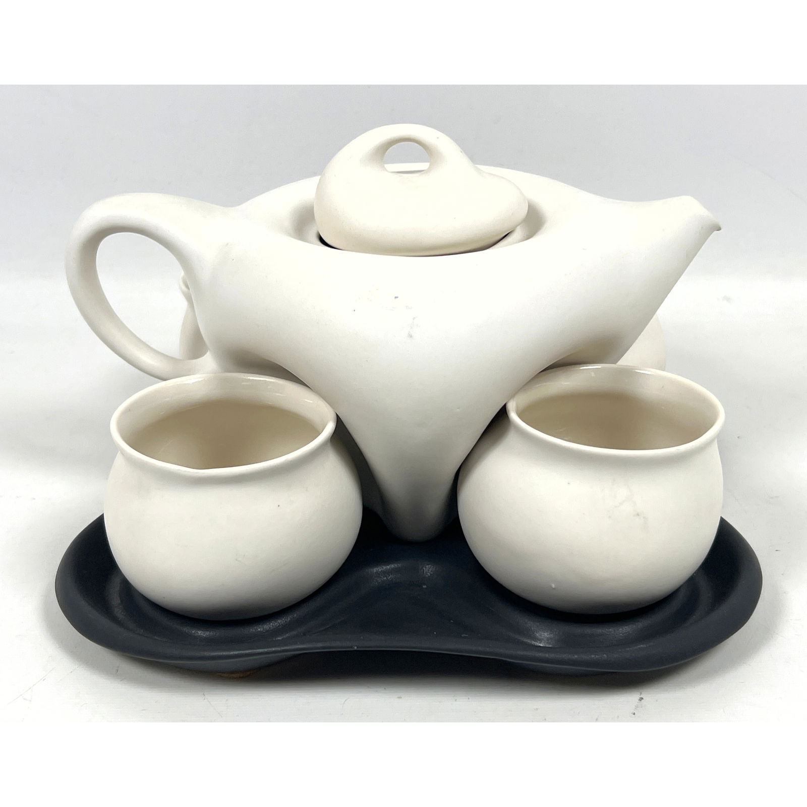 Peter Saenger Star Trek Tea Set. Black and white. Design II: Peter Saenger Star Trek Tea Set. Black and white. Design II Dimensions: Height: 6.5 inches, Width: 11 inches, Depth: 11 inches. --- US Packing and Shipping charge: In house shipping available. Will be