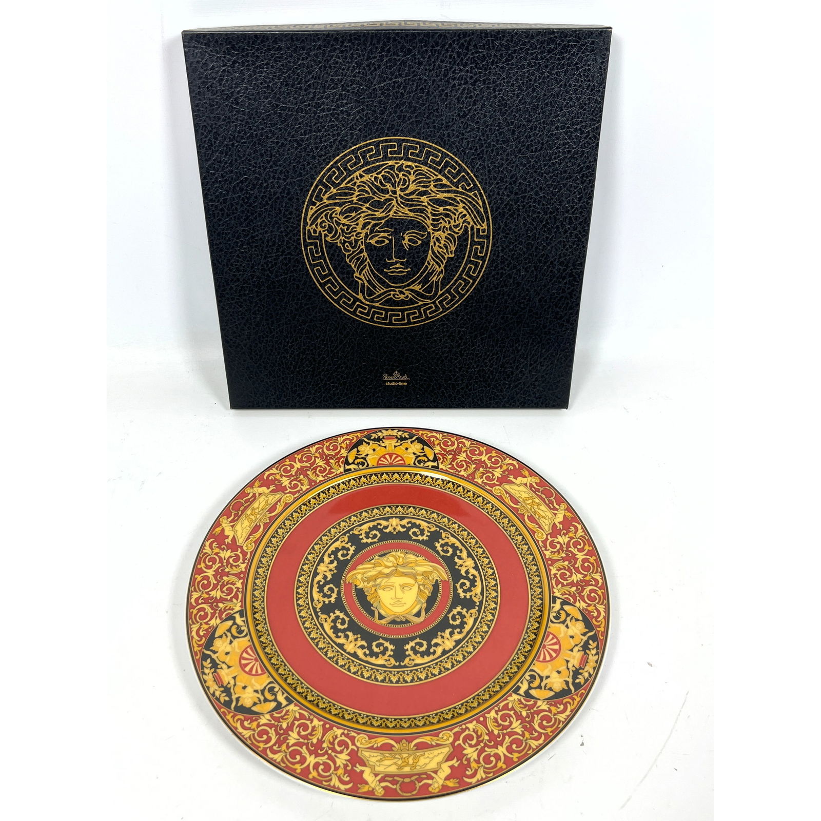 Versace Rosenthal Studio Line Medusa Plate in Original Box.: Versace Rosenthal Studio Line Medusa Plate in Original Box. Dimensions: Height: 12 inches, Width: 12 inches, Depth: 1 inches. --- - We offer curbside delivery for most items to NYC, Manhattan, Close B