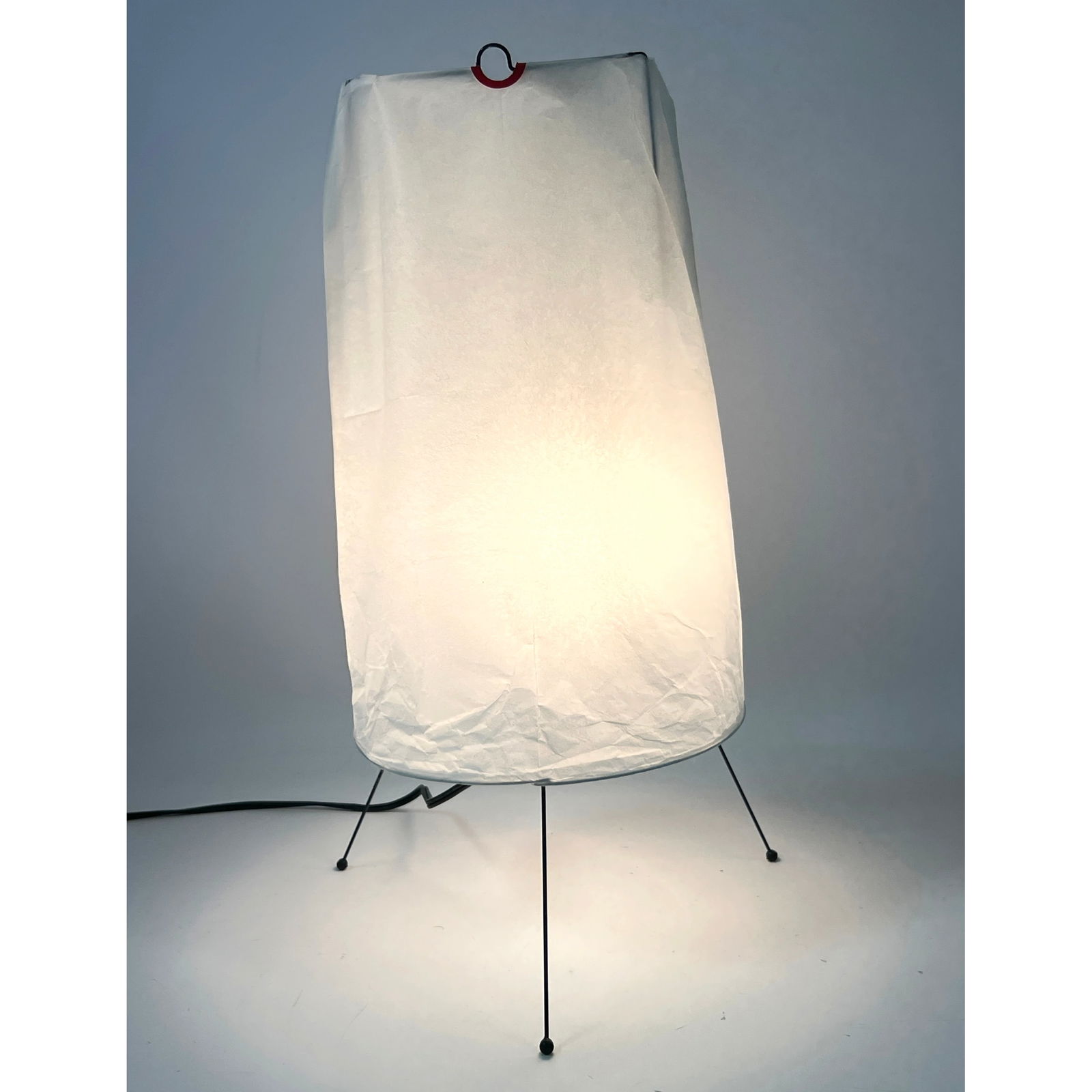 ISAMU NOGUCHI Signed Paper Shade Akari Lamp.: ISAMU NOGUCHI Signed Paper Shade Akari Lamp. Dimensions: Height: 19 inches, Width: 9 inches, Depth: 10 inches. --- US Packing and Shipping charge: In house shipping available. Will be calculated once