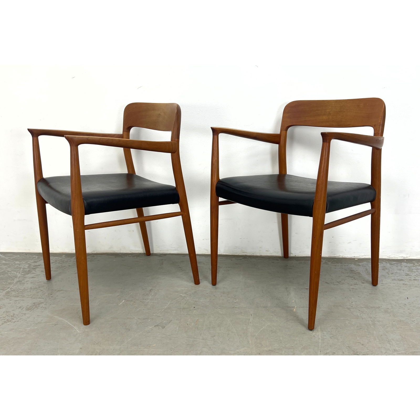 Pair Vintage Danish Modern Dining Chairs by N. O Moller for Jl Moller.: Pair Vintage Danish Modern Dining Chairs by N. O Moller for Jl Moller. Dimensions: Height: 30 inches, Width: 22.5 inches, Depth: 18 inches. - Seat Height: 18.5 inches --- - We offer curbside delivery