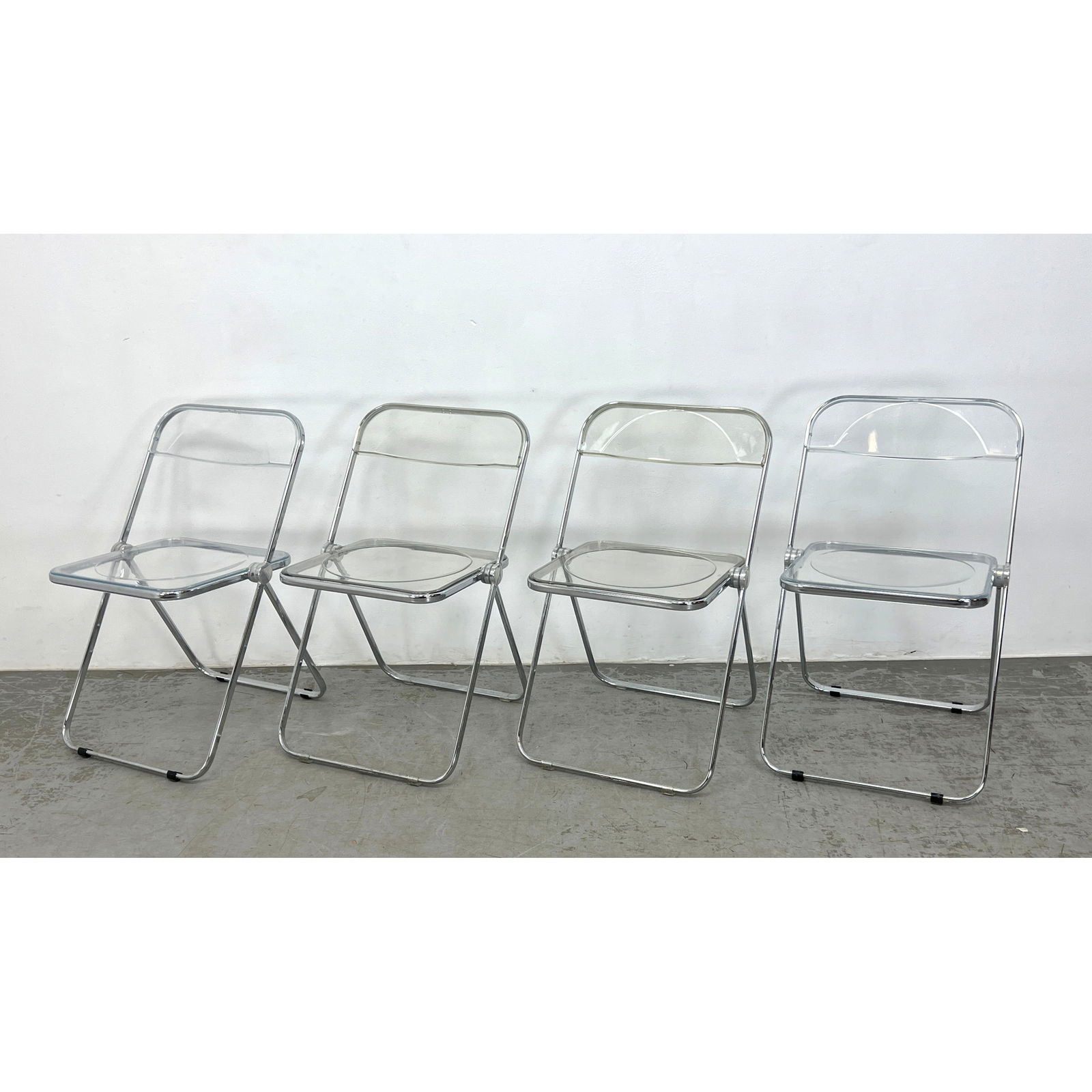 Set 4 Pia Castelli Italy folding chairs. Silver metal frames support molded Lucite seats. Marked. (1 of 12)