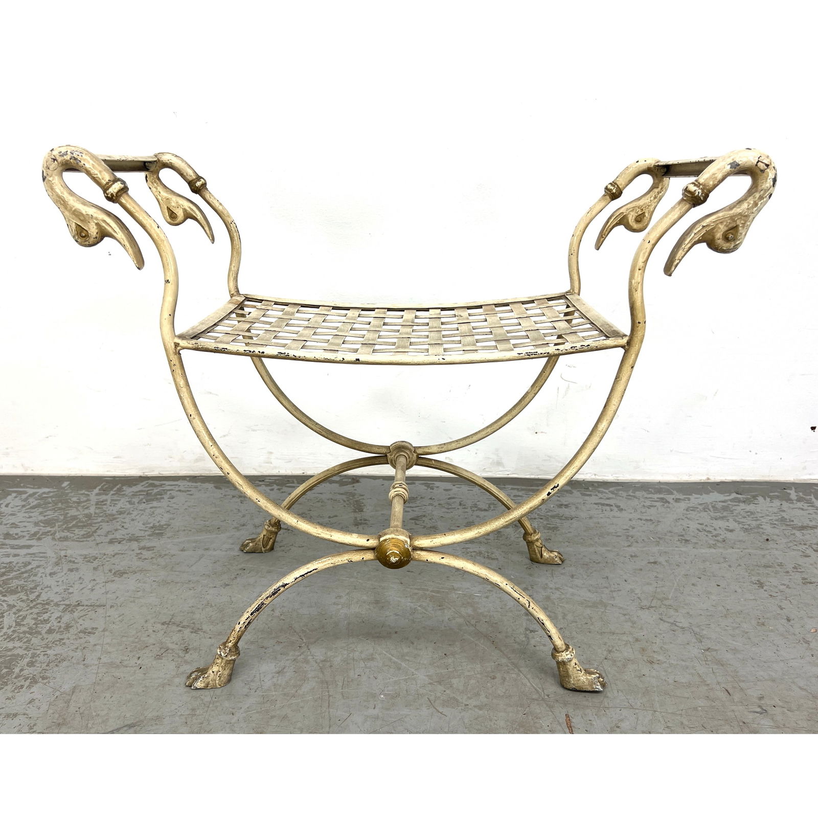 Regency style Iron Vanity Bench with Swan Heads. Painted finish.: Regency style Iron Vanity Bench with Swan Heads. Painted finish. Dimensions: Height: 22.5 inches, Width: 27 inches, Depth: 12.5 inches. --- - We offer curbside delivery for most items to NYC, Manhatta