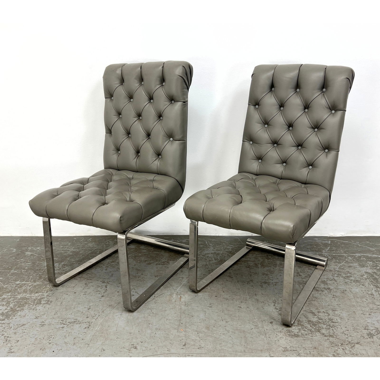 Pr Gray Leather Chrome Frame Dining Chairs. Tufted Leather Upholstery. Pace unsigned. (1 of 15)