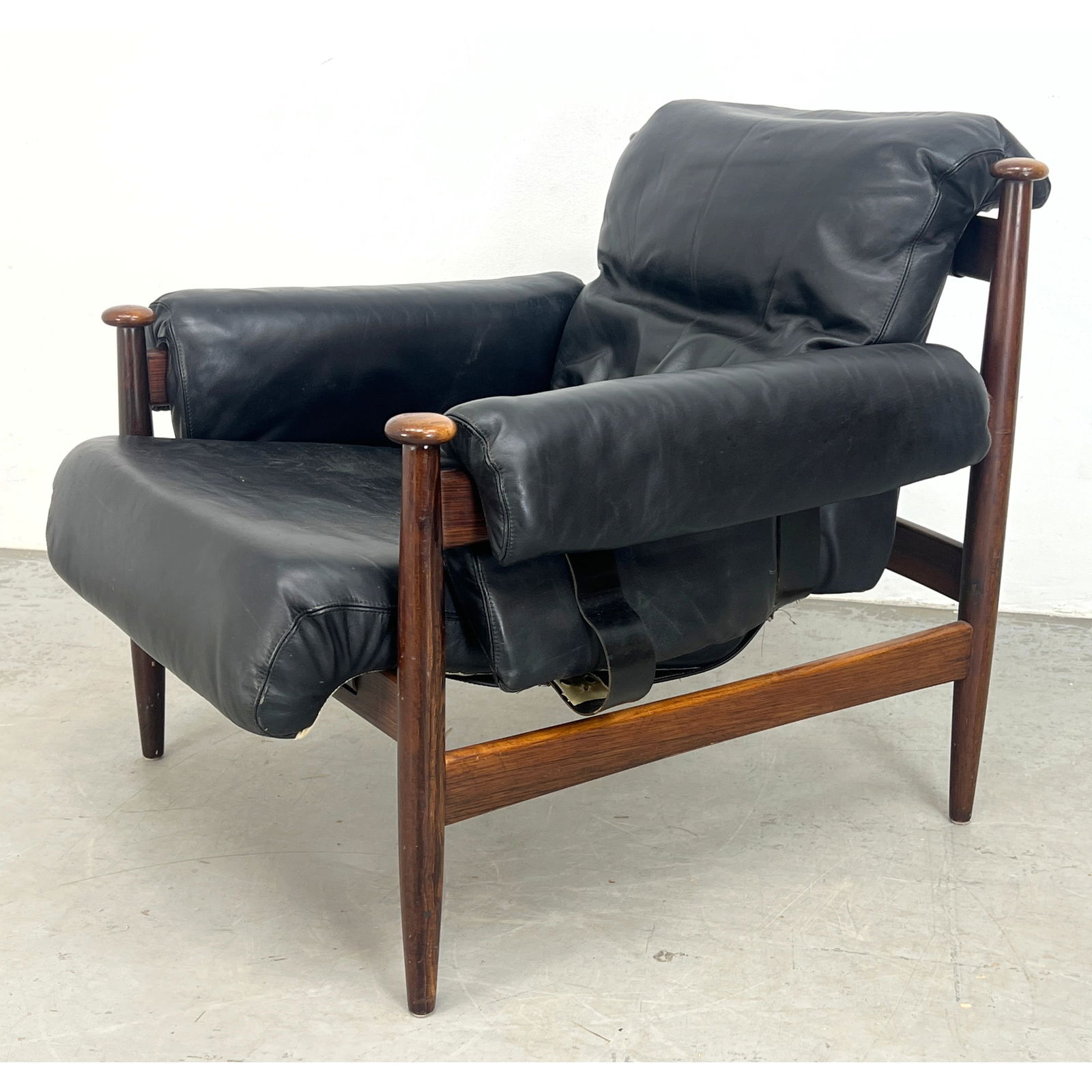 Amiral" Lounge Chair by Eric Merthen for Ire Mobler. Rosewood and leather. Skillingaryd Sweden.: Amiral" Lounge Chair by Eric Merthen for Ire Mobler. Rosewood and leather. Skillingaryd Sweden. Dimensions: Height: 31 inches, Width: 33 inches, Depth: 37.5 inches. - Seat Height: 17 inches --- - We o