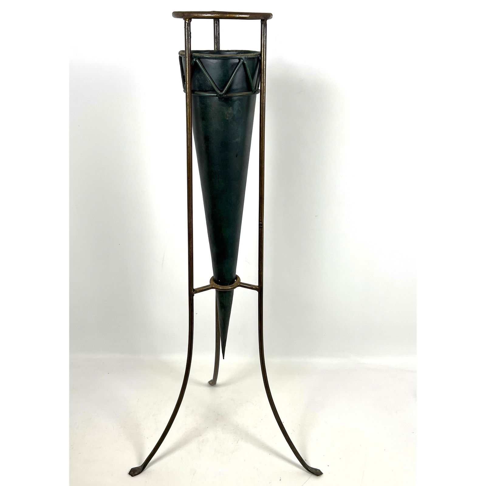 Tall Cone form Metal Sculpture/Vase In Tripod Base Iron Stand. Contemporary.: Tall Cone form Metal Sculpture/Vase In Tripod Base Iron Stand. Contemporary. Dimensions: Height: 34.5 inches, Width: 13.5 inches, Depth: 15 inches. --- - We offer curbside delivery for most items to N