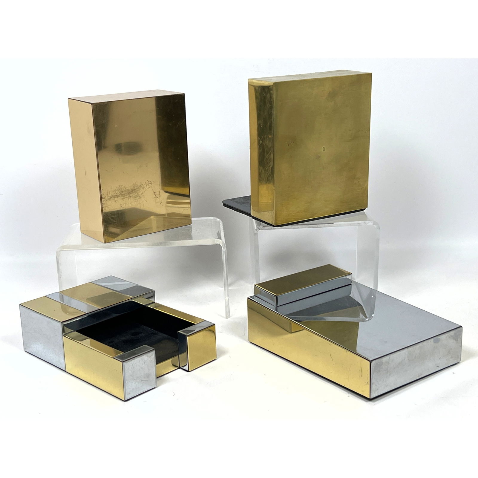 Paul Evans Cityscape Chrome and Brass Desk Accessories. Bookends, Notepad Clipboard, Index Card Disp: Paul Evans Cityscape Chrome and Brass Desk Accessories. Bookends, Notepad Clipboard, Index Card Dispenser. Unmarked. Dimensions: Height: 6.25 inches, Width: 5 inches, Depth: 5 inches. --- US Packing a