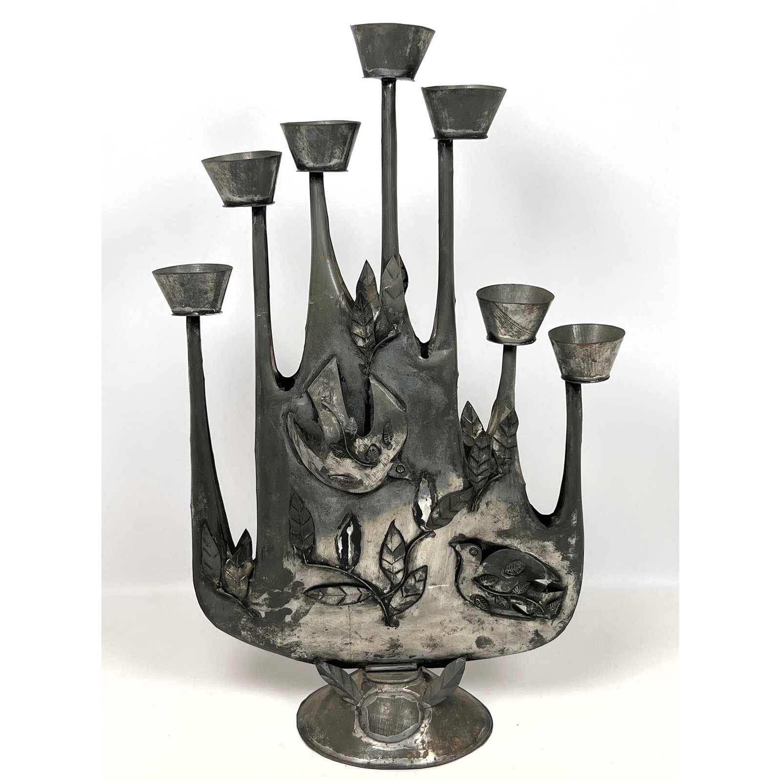 GENE BYRON Punched Tin Menorah. Mexico. Raised applied bird details. Marked Mexico.: GENE BYRON Punched Tin Menorah. Mexico. Raised applied bird details. Marked Mexico. Dimensions: Height: 23 inches, Width: 14.5 inches, Depth: 5 inches. --- US Packing and Shipping charge: In house shi