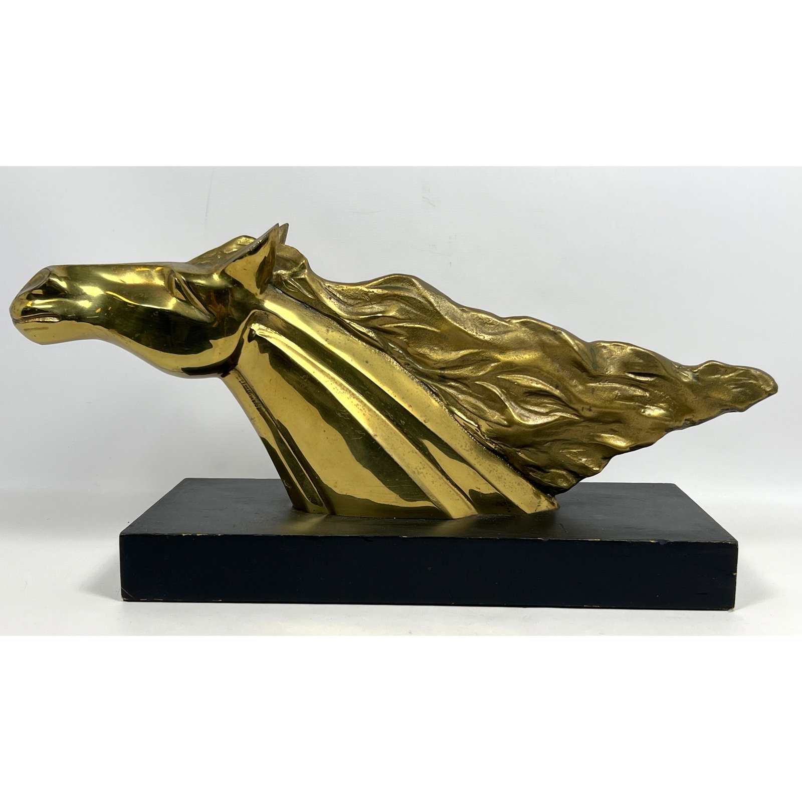 Art Deco Style Brass Horse Head Sculpture with Flowing Mane.: Art Deco Style Brass Horse Head Sculpture with Flowing Mane. Dimensions: Height: 11.5 inches, Width: 23.5 inches, Depth: 8 inches. --- US Packing and Shipping charge: In house shipping available. Will
