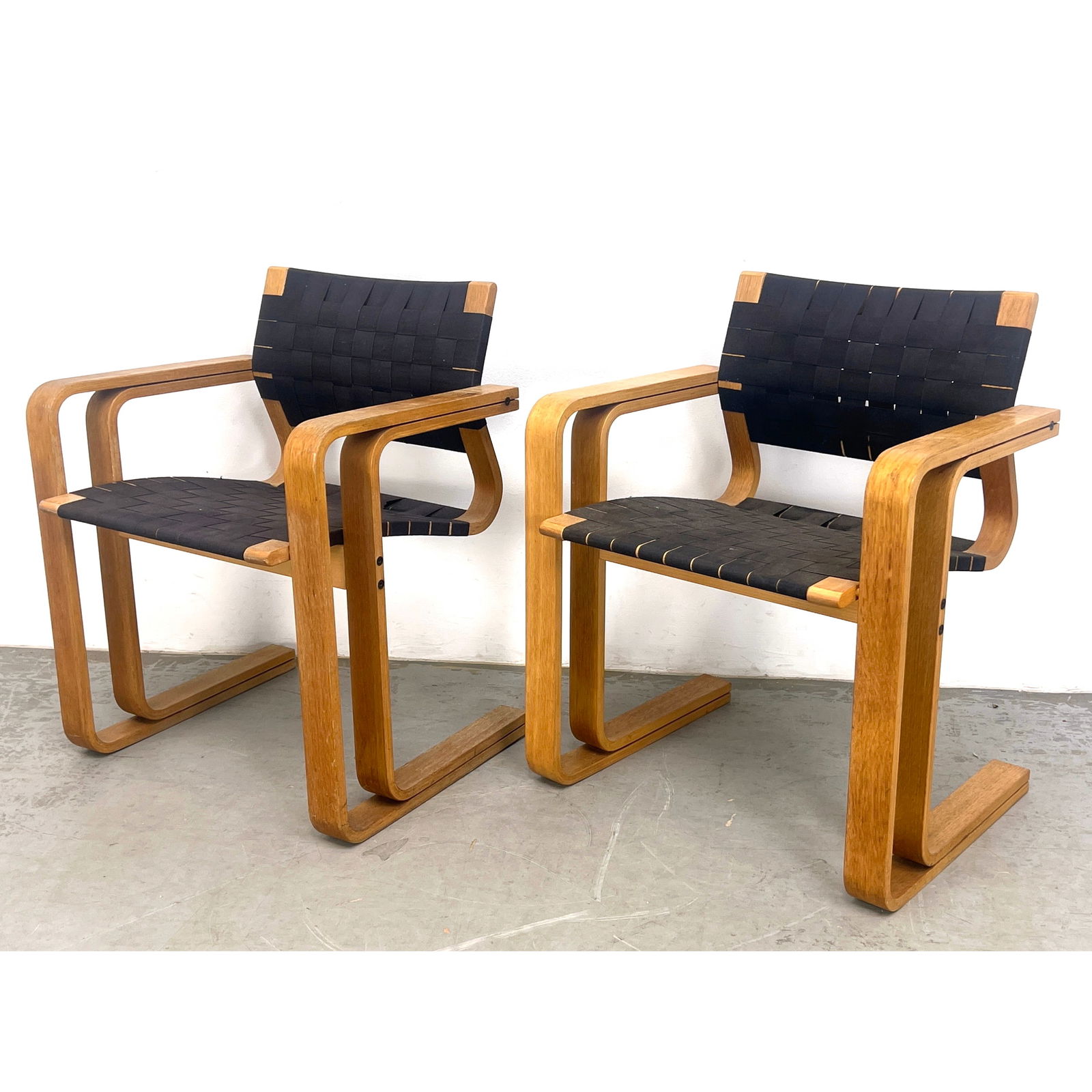 Pair Thygesen and Sorensen for Magnus Olesen Arm Chairs.: Pair Thygesen and Sorensen for Magnus Olesen Arm Chairs. Dimensions: Height: 29.5 inches, Width: 24 inches, Depth: 20 inches. - Seat Height: 17 inches --- - We offer curbside delivery for most items t