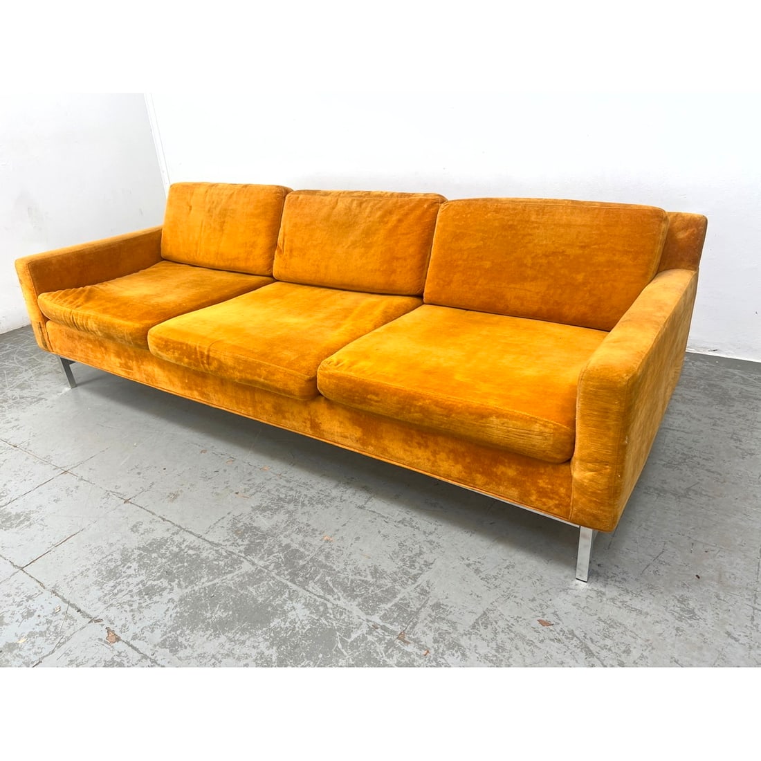 Orange Mid-Century Modern sofa. Vintage. Chrome legs. (1 of 12)