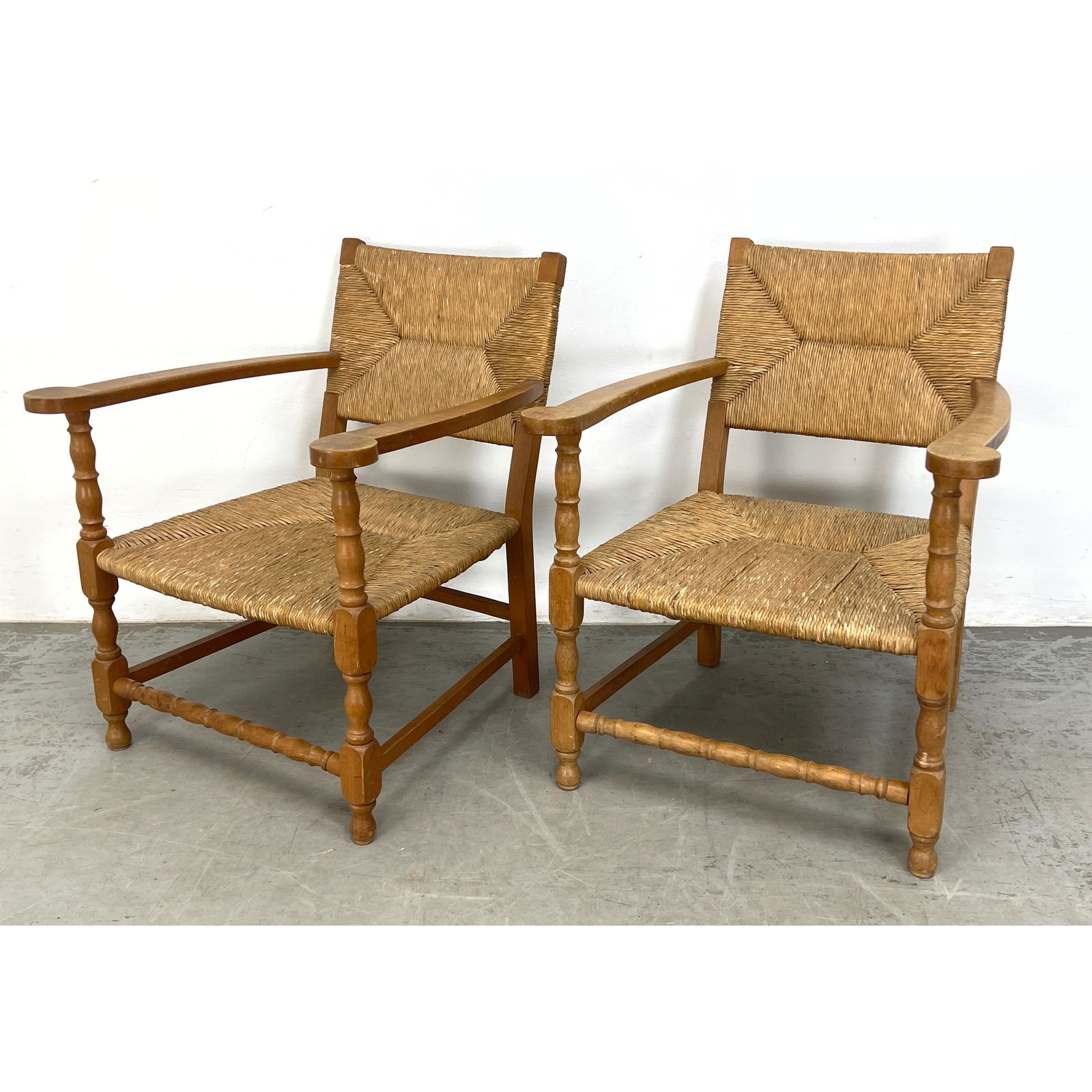 Pair French Rush Turned-Wood Armchairs: Pair French Rush Turned-Wood Armchairs Dimensions: Height: 31 inches, Width: 25.75 inches, Depth: 28 inches. - Seat Height: 14 inches --- - We offer curbside delivery for most items to NYC, Manhattan,