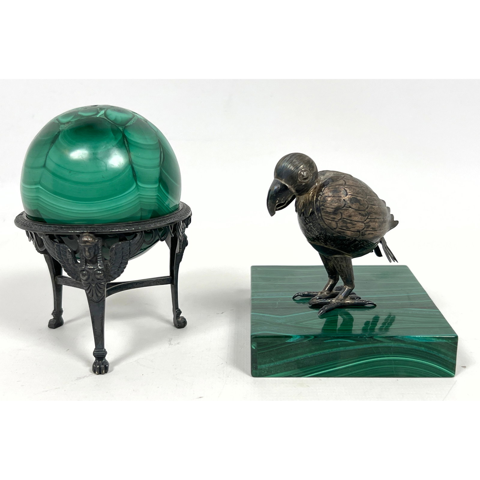 2pc Malachite Decorative Table Objects. 1) 925 Sterling Silver Mexico Bird sits on Malachite Square: 2pc Malachite Decorative Table Objects. 1) 925 Sterling Silver Mexico Bird sits on Malachite Square Base. Bird marked as shown. 2) Malachite Sphere on Neo Classical Egyptian Revival Figural Tripod Met